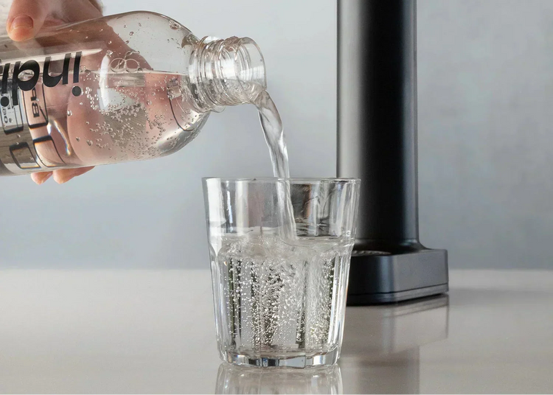 Why is making your own sparkling water at home a more environmentally friendly choice?